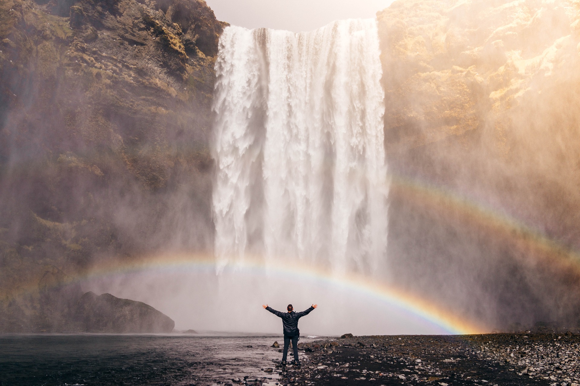 joyful man, rainbow waterfall, Octavia Brooks, Reclaim energy, fresh new year
